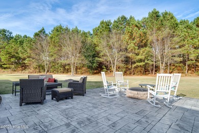 Nestled in the prestigious gated community of River Landing on River Landing Golf Course in North Carolina - for sale on GolfHomes.com, golf home, golf lot