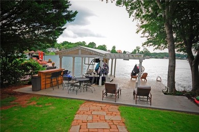 Lakefront Luxury Living! This immaculate open-concept ranch on Fairfield Plantation Golf and Country Club in Georgia - for sale on GolfHomes.com, golf home, golf lot