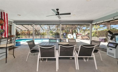 This beautiful 4 bedroom 3 bathroom pool home is located on the on IMG Academies Golf and Country Club in Florida - for sale on GolfHomes.com, golf home, golf lot
