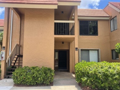 Spacious and bright 2nd floor unit in a 55+ gated community with on Indian Spring Golf and Country Club in Florida - for sale on GolfHomes.com, golf home, golf lot