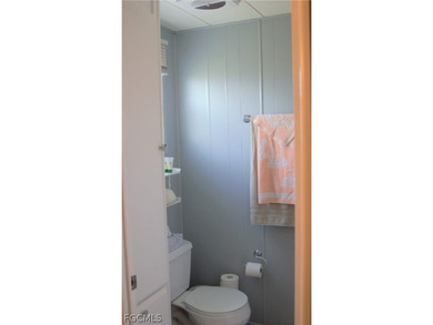 Own the Land in Naples! Home needs flooring and shower repairs on Riviera Golf Club in Florida - for sale on GolfHomes.com, golf home, golf lot