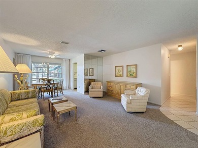 Welcome to this waterfront well-maintained two-bedroom, two-bath on Highland Lakes Executive Golf Course in Florida - for sale on GolfHomes.com, golf home, golf lot