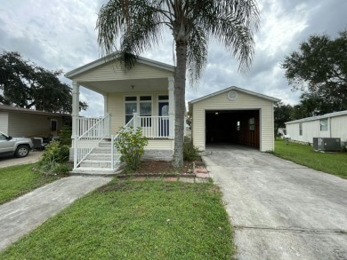 Welcome to your perfect Florida retreat! Nestled in the highly on Golden Lakes Golf Course in Florida - for sale on GolfHomes.com, golf home, golf lot