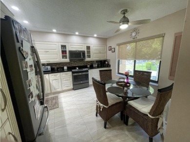 Spacious and bright 2nd floor unit in a 55+ gated community with on Indian Spring Golf and Country Club in Florida - for sale on GolfHomes.com, golf home, golf lot