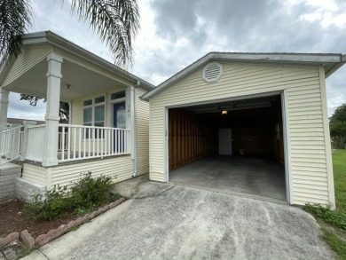 Welcome to your perfect Florida retreat! Nestled in the highly on Golden Lakes Golf Course in Florida - for sale on GolfHomes.com, golf home, golf lot