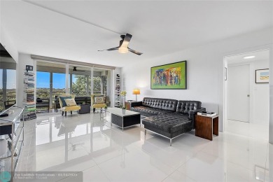 Nestled in a charming five-story condo community, this home on Palm-Aire Country Club and Resort - Palms in Florida - for sale on GolfHomes.com, golf home, golf lot