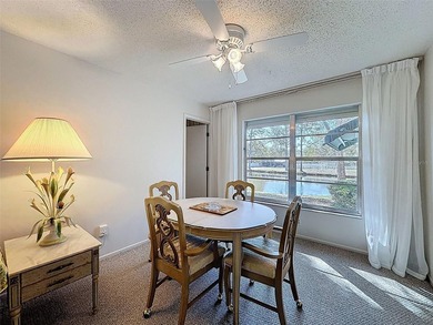 Welcome to this waterfront well-maintained two-bedroom, two-bath on Highland Lakes Executive Golf Course in Florida - for sale on GolfHomes.com, golf home, golf lot