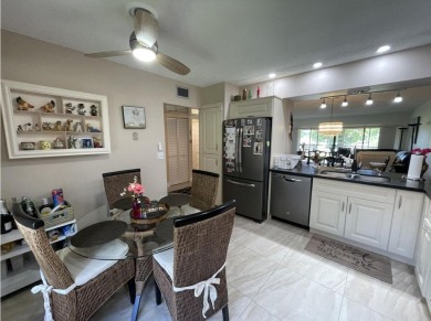 Spacious and bright 2nd floor unit in a 55+ gated community with on Indian Spring Golf and Country Club in Florida - for sale on GolfHomes.com, golf home, golf lot