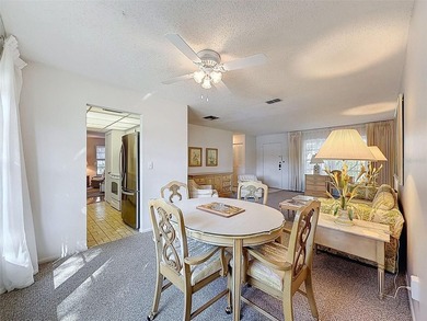 Welcome to this waterfront well-maintained two-bedroom, two-bath on Highland Lakes Executive Golf Course in Florida - for sale on GolfHomes.com, golf home, golf lot