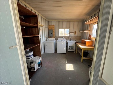 Own the Land in Naples! Home needs flooring and shower repairs on Riviera Golf Club in Florida - for sale on GolfHomes.com, golf home, golf lot