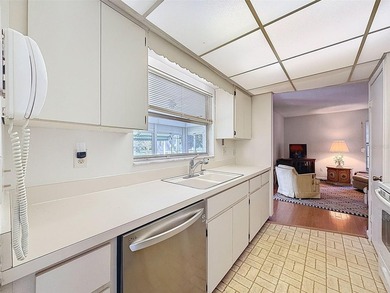 Welcome to this waterfront well-maintained two-bedroom, two-bath on Highland Lakes Executive Golf Course in Florida - for sale on GolfHomes.com, golf home, golf lot