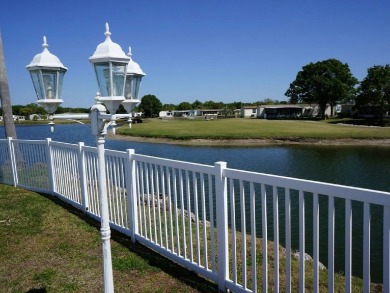 Welcome to your perfect Florida retreat! Nestled in the highly on Golden Lakes Golf Course in Florida - for sale on GolfHomes.com, golf home, golf lot