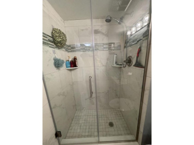Spacious and bright 2nd floor unit in a 55+ gated community with on Indian Spring Golf and Country Club in Florida - for sale on GolfHomes.com, golf home, golf lot