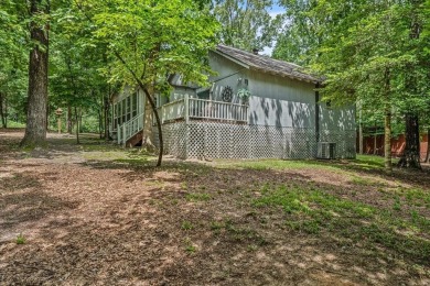Immaculate and impeccably maintained home on a lovely wooded lot on Holly Lake Ranch Golf Club in Texas - for sale on GolfHomes.com, golf home, golf lot