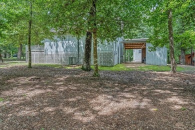 Immaculate and impeccably maintained home on a lovely wooded lot on Holly Lake Ranch Golf Club in Texas - for sale on GolfHomes.com, golf home, golf lot