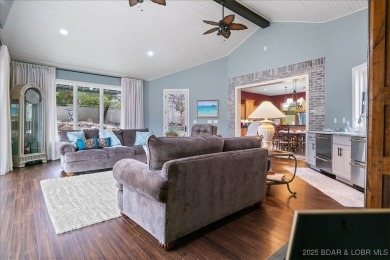 Discover the perfect blend of elegance and comfort in this on The Oaks Golf Course in Missouri - for sale on GolfHomes.com, golf home, golf lot