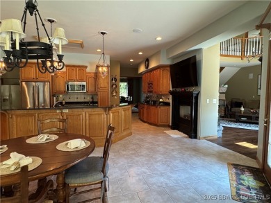 Discover the perfect blend of elegance and comfort in this on The Oaks Golf Course in Missouri - for sale on GolfHomes.com, golf home, golf lot