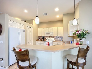 Welcome to this stunning HIBISCUS patio home situated in the on Herons Glen Golf and Country Club in Florida - for sale on GolfHomes.com, golf home, golf lot