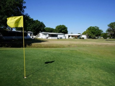 Discover your ideal Florida retreat in this well-maintained 1 on Golden Lakes Golf Course in Florida - for sale on GolfHomes.com, golf home, golf lot