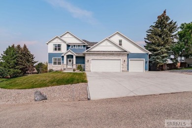 Stunning home nestled in a quiet, secluded neighborhood right on Idaho Falls Country Club in Idaho - for sale on GolfHomes.com, golf home, golf lot