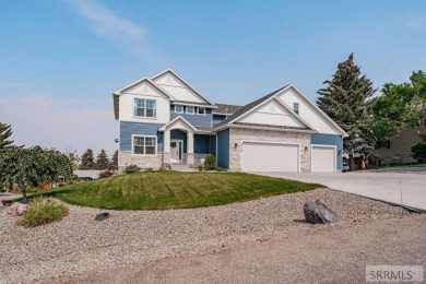 Stunning home nestled in a quiet, secluded neighborhood right on Idaho Falls Country Club in Idaho - for sale on GolfHomes.com, golf home, golf lot