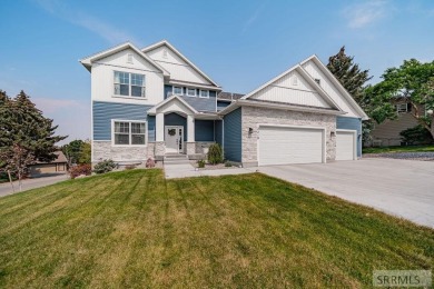 Stunning home nestled in a quiet, secluded neighborhood right on Idaho Falls Country Club in Idaho - for sale on GolfHomes.com, golf home, golf lot