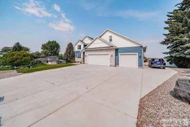 Stunning home nestled in a quiet, secluded neighborhood right on Idaho Falls Country Club in Idaho - for sale on GolfHomes.com, golf home, golf lot