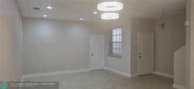 Stunning & spacious 3 bedroom 2.5-bathroom townhouse with on The Carolina Club in Florida - for sale on GolfHomes.com, golf home, golf lot