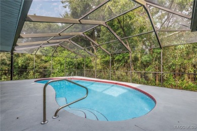 BEAUTIFUL SPACIOUS POOL HOME! This 4 bedroom 2 1/2 baths & 2 car on Sugarmill Woods Golf and Country Club in Florida - for sale on GolfHomes.com, golf home, golf lot