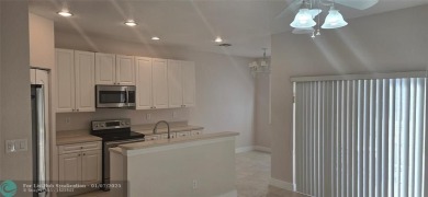 Stunning & spacious 3 bedroom 2.5-bathroom townhouse with on The Carolina Club in Florida - for sale on GolfHomes.com, golf home, golf lot