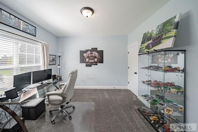 Stunning home nestled in a quiet, secluded neighborhood right on Idaho Falls Country Club in Idaho - for sale on GolfHomes.com, golf home, golf lot