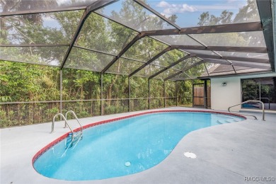 BEAUTIFUL SPACIOUS POOL HOME! This 4 bedroom 2 1/2 baths & 2 car on Sugarmill Woods Golf and Country Club in Florida - for sale on GolfHomes.com, golf home, golf lot