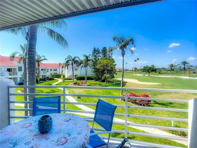 Welcome Home!  This amazing second-floor condo is located in on Isla Del Sol Yacht and Country Club in Florida - for sale on GolfHomes.com, golf home, golf lot