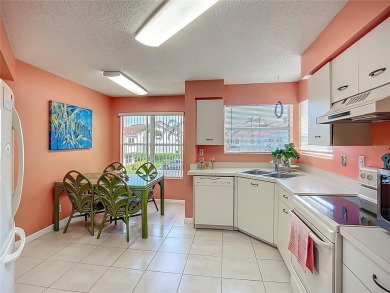 Welcome Home!  This amazing second-floor condo is located in on Isla Del Sol Yacht and Country Club in Florida - for sale on GolfHomes.com, golf home, golf lot