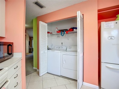 Welcome Home!  This amazing second-floor condo is located in on Isla Del Sol Yacht and Country Club in Florida - for sale on GolfHomes.com, golf home, golf lot
