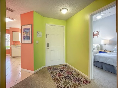 Welcome Home!  This amazing second-floor condo is located in on Isla Del Sol Yacht and Country Club in Florida - for sale on GolfHomes.com, golf home, golf lot