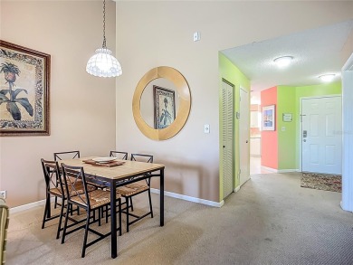 Welcome Home!  This amazing second-floor condo is located in on Isla Del Sol Yacht and Country Club in Florida - for sale on GolfHomes.com, golf home, golf lot
