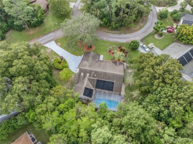 BEAUTIFUL SPACIOUS POOL HOME! This 4 bedroom 2 1/2 baths & 2 car on Sugarmill Woods Golf and Country Club in Florida - for sale on GolfHomes.com, golf home, golf lot