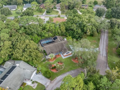 BEAUTIFUL SPACIOUS POOL HOME! This 4 bedroom 2 1/2 baths & 2 car on Sugarmill Woods Golf and Country Club in Florida - for sale on GolfHomes.com, golf home, golf lot