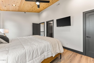 Luxury New Construction Pool Cabin showcasing panoramic views of on Sevierville Golf Club in Tennessee - for sale on GolfHomes.com, golf home, golf lot