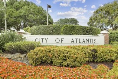 This charming single-family residence boasting 2 bedrooms and 2 on Atlantis Golf Club in Florida - for sale on GolfHomes.com, golf home, golf lot