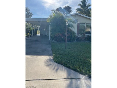 A 1982 manufactured home in Riviera Golf
Estates, a very on Riviera Golf Club in Florida - for sale on GolfHomes.com, golf home, golf lot