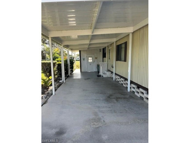 A 1982 manufactured home in Riviera Golf
Estates, a very on Riviera Golf Club in Florida - for sale on GolfHomes.com, golf home, golf lot