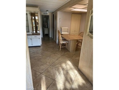 A 1982 manufactured home in Riviera Golf
Estates, a very on Riviera Golf Club in Florida - for sale on GolfHomes.com, golf home, golf lot