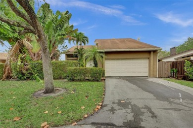 Charming 4-bedroom, 3-bathroom home in the desirable West on Calusa Country Club in Florida - for sale on GolfHomes.com, golf home, golf lot