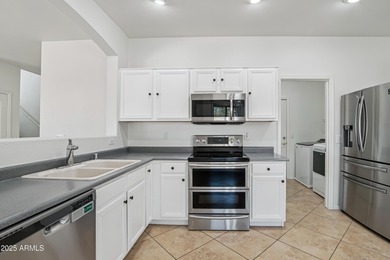 Welcome to this beautifully refreshed two-story 2,659 sq ft home on The Golf Club At Johnson Ranch in Arizona - for sale on GolfHomes.com, golf home, golf lot