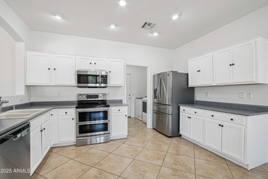 Welcome to this beautifully refreshed two-story 2,659 sq ft home on The Golf Club At Johnson Ranch in Arizona - for sale on GolfHomes.com, golf home, golf lot