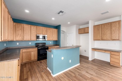 Beautiful five-bedroom, three-bathroom home located in a gated on Southern Ridge Golf Club in Arizona - for sale on GolfHomes.com, golf home, golf lot