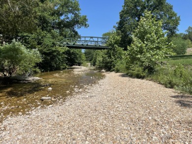 Looking to build your dream home in an excellent location?  This on Ledgestone Country Club and Golf Course in Missouri - for sale on GolfHomes.com, golf home, golf lot