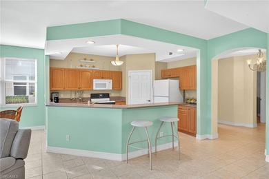 Beautiful First-Floor Carriage Home with Fairway Views!  This on West Bay Beach and Golf Club in Florida - for sale on GolfHomes.com, golf home, golf lot